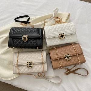 Minimalist square flap crossbody bag with chain strap and quilted faux leather design