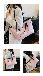 Detailed views of a pink pleated tote bag with black bow patterns and dual handles