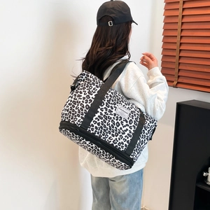 Large leopard print canvas duffel bag with waterproof dry-wet separation and shoe compartment