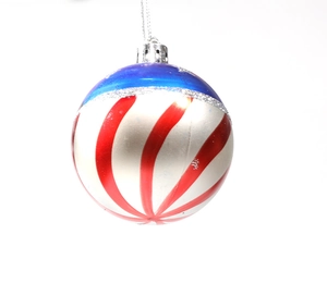Detailed view of patriotic US flag style Christmas ball with silver stars and stripes