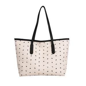 Sac fourre-tout crème chic avec imprimé nœud noir et anses en cuir pour femmes été