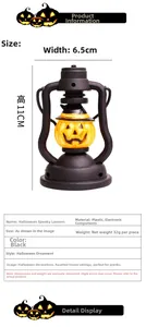 Detail of Halloween pumpkin lantern 11cm height showing retro frame and LED light