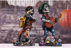 Macro view of skeleton band figurines with saxophone and guitar for Halloween decor