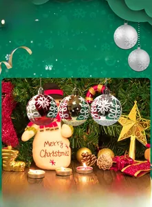 Detailed view of red, gold, and silver Christmas balls with snowflake and tree patterns