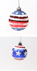 Detail of red white and blue American flag style decorative balls with glitter and stars