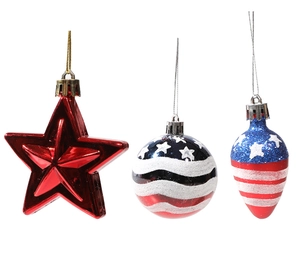 Detail of red star, American flag sphere and drop-shaped Independence Day ornaments