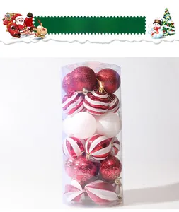 Detail of red and white Christmas ball set with assorted textures in a clear cylindrical box