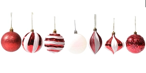Set of seven red and white Christmas ornaments with glitter, spiral, and embossed patterns