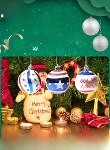 Close-up of red white and blue star striped Christmas ornaments with God Bless America text