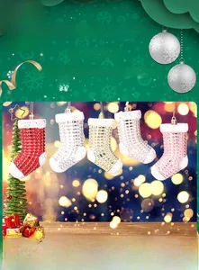 Close-up of textured plastic electroplated Christmas stocking ornaments with metallic finish