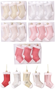 Detail of glittery mesh textured Christmas stocking ornaments in 5 metallic colors