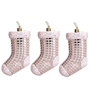 Three pink plated Christmas stocking ornaments with checkered pattern and white glitter details