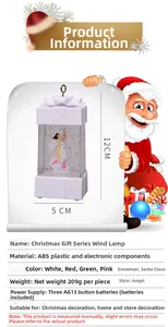 Detailed specs of 12x5cm white Christmas angel lantern with water glitter and bow