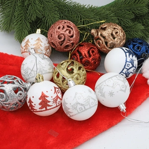 Set de 9 bolas de Navidad caladas y pintadas con purpurina para decorar el árbol