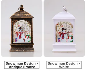 Detail van kerstlantaarns in brons en wit met patronen van sneeuwpoppen