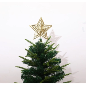 Close-up of golden glitter Christmas tree topper star with spiral spring base on tree