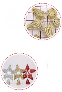 Detail of glittered iron star Christmas tree topper with spring base in gold, red and silver