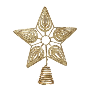 Detail of golden glitter Christmas tree topper star with hollow leaf patterns