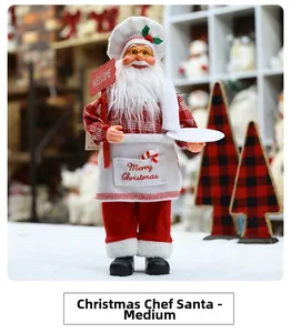 Detail of Santa Claus chef figurine holding a welcome sign for Christmas window display