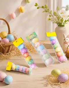Set of six colorful Easter eggs with textured surface and hanging strings for decor