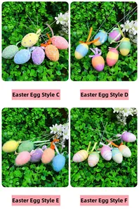 Detail view of colorful Easter egg ornaments with glitter and stripes on green grass