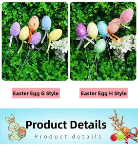 Close-up of Easter egg picks with glitter foam, ribbons and long sticks for floral decor