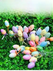 Close-up of colorful foam Easter egg floral picks with glitter and ribbon bows decoration