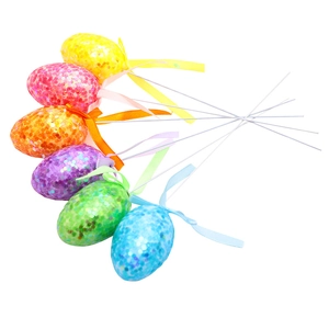 Set of 6 colorful glittery Easter egg picks with bows for festive floral arrangements