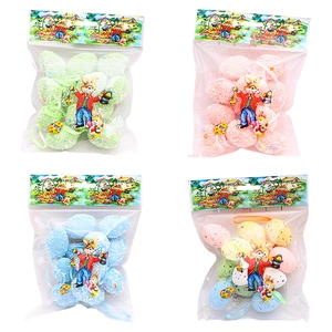 Uova di Pasqua appese glitterate in rosa blu e verde per decorazioni festive fai-da-te