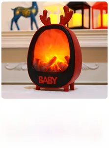 Detail of red fireplace lantern with reindeer antlers and glowing warm fire effect