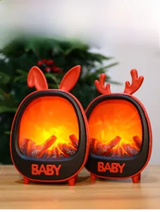 Miniature red fireplace lamps with rabbit ears and antlers showing realistic flame effects
