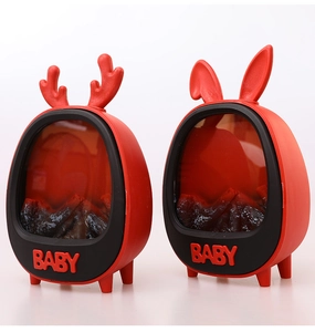Detail of red fireplace lanterns in retro TV shape with reindeer antlers and rabbit ears