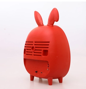 Detail of red rabbit lantern with speaker grill, USB port and power switch on back