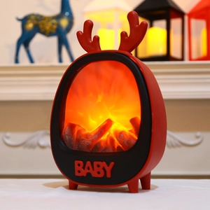 Cartoon fireplace night light with deer antlers and glowing fire effect for home decor