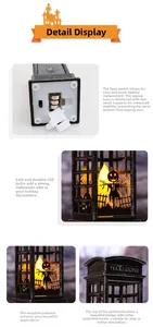 Close-up of Halloween telephone booth lantern with LED light and pumpkin patterns