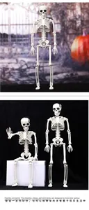 Detail of poseable joints on a white plastic Halloween skeleton prop for spooky decor