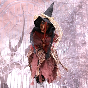 Hanging Halloween witch on broomstick decoration for haunted house party and home ornaments