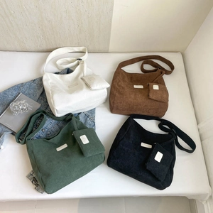 Large corduroy tote bag in four colors with a matching mini coin purse and shoulder strap