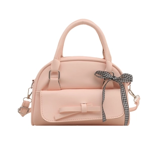 Chic pink shell-shaped tote bag with ribbon bow accents and detachable shoulder strap