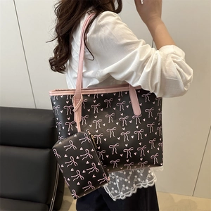 Sac fourre-tout noir avec motif nœuds roses et petite pochette assortie pour femme
