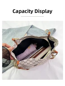 Interior view of tote bag showing capacity for umbrella, wallet, and notebook