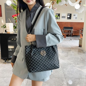 Classic black tote bag with gray M letter print and gold logo for daily office commuting