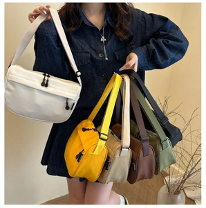 Detailed comparison of minimalist shoulder bags in white, yellow, brown, and green