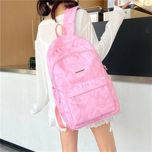Sac à dos rose avec motifs d'ours et grande capacité porté par un mannequin