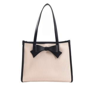 French chic off-white pleated tote bag with large black bow detail for summer
