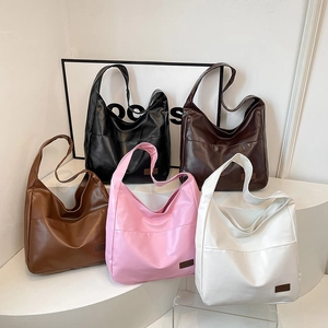 Minimalist large capacity PU leather tote bags in five versatile colors on display
