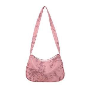 Pink underarm bag with bamboo leaf print and top zipper closure on white background
