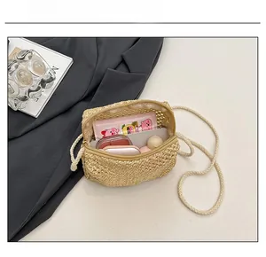 Top view of handmade straw square bag showing capacity for phone and cosmetics