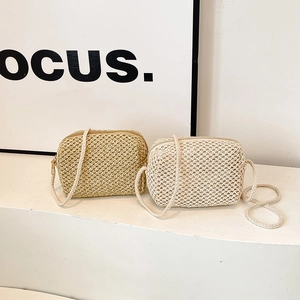 Mini handmade straw woven crossbody bags in beige and natural tan colors for summer