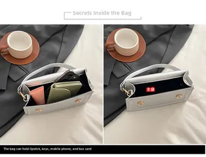 Detalle del interior del bolso plateado con compartimento para objetos esenciales diarios